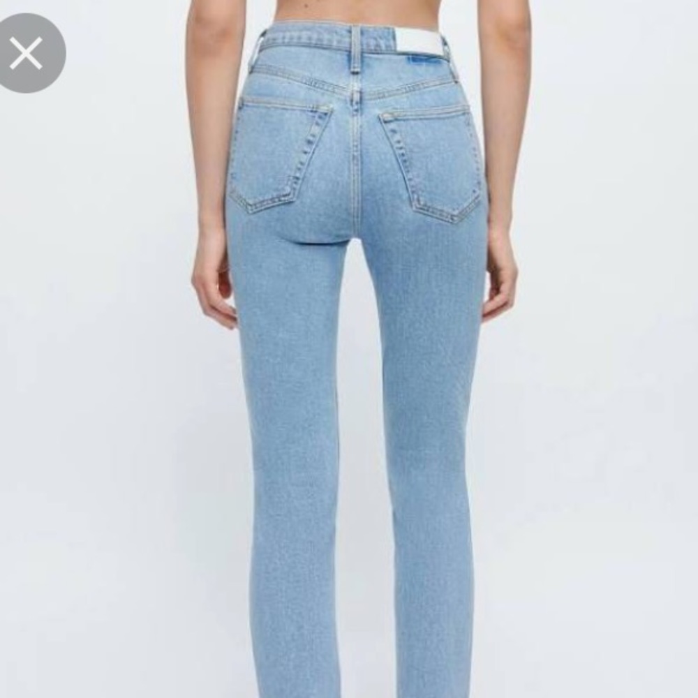 Redone 90’s High Rise Jeans 27 light wash raw hem stretch
